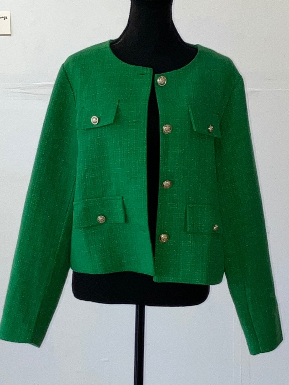 French inspired green, collarless, tweed jacket